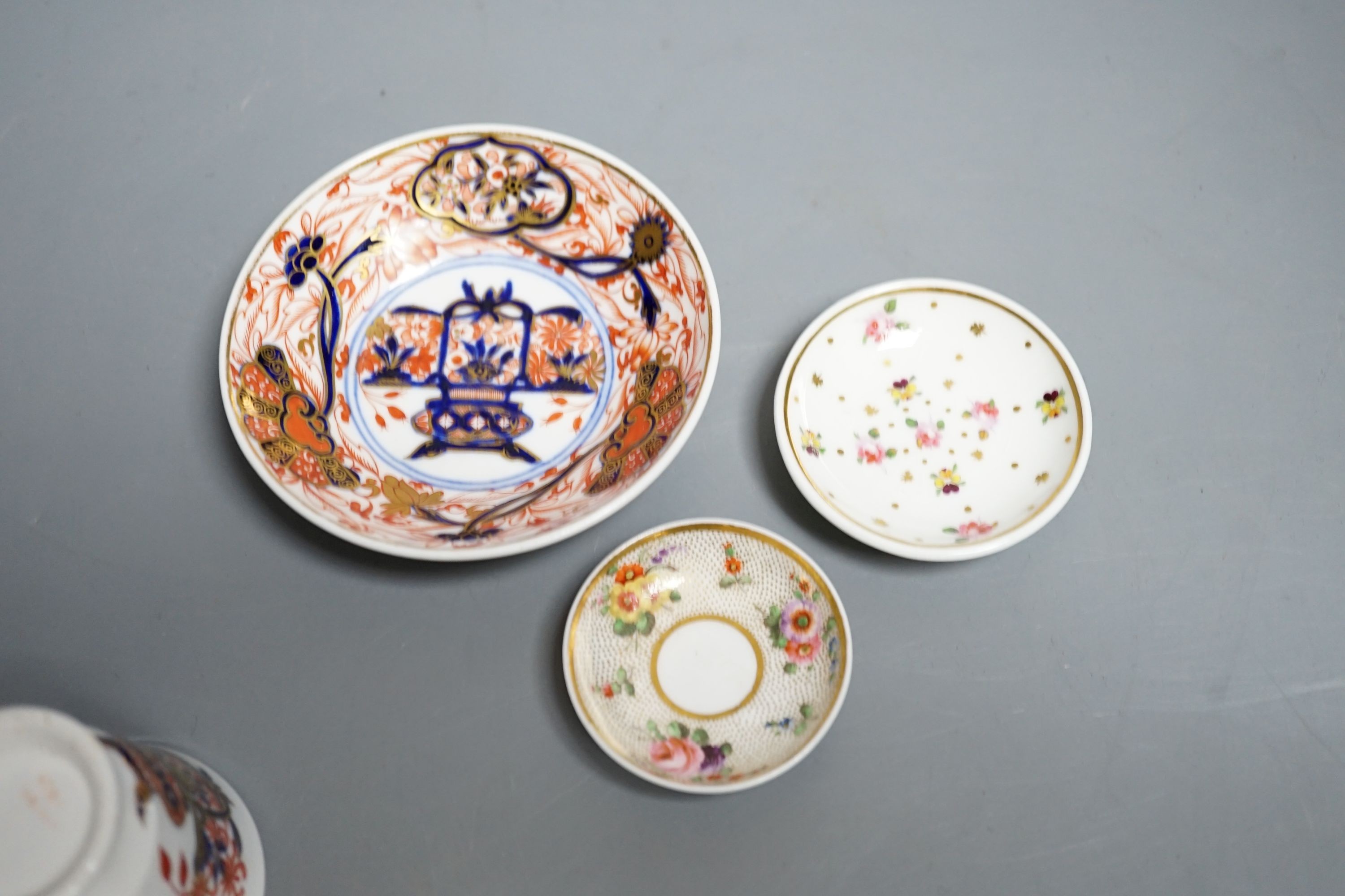 Three Spode miniature teacups and saucers, c.1815. Provenance - Mona Sattin collection of miniature cups and saucers, collection no.s 120, 121 & 130.